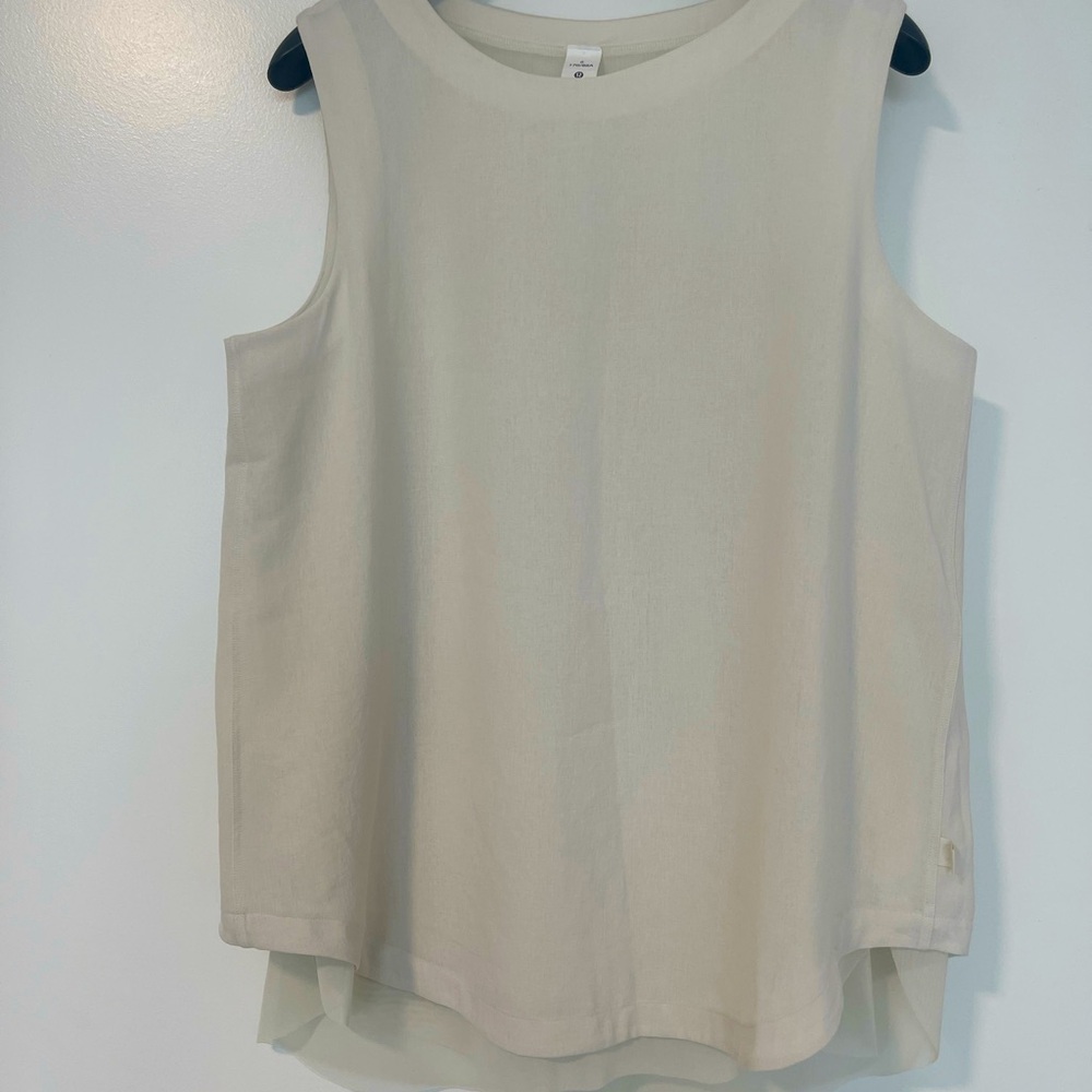 Lululemon neutral sleeveless blouse. As new condition